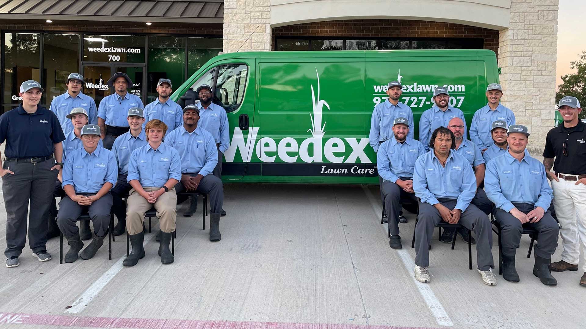 Weedex Lawn Care team in front of the Weedex office in Lewisville, Texas.