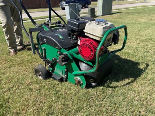 Core Aeration Machine on north Texas lawn